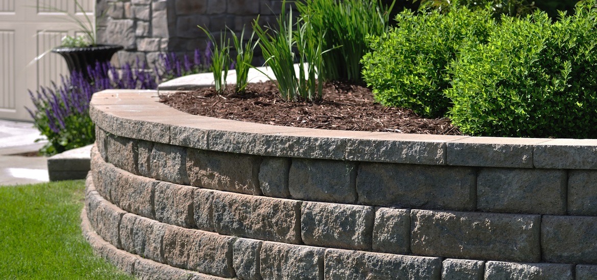 Retaining wall and brick paver construction